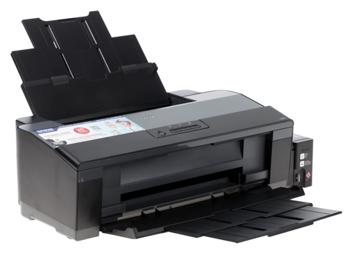 Принтер струйный Epson L1300, A3, цветной, A4 ч/б: 30 стр/мин/15 стр/мин, A4 цв.: 15 стр/мин/5.5 стр/мин, 5760x1440dpi, СНПЧ (C11CD81402/C11CD81403/C11CD81504/C11CD81505) б/у, после ремонта (замена роликов подачи/захвата бумаги), следы эксплуатации, замятия на коробке, редкие потертости/царапины по корпусу принтера, следы от скотча по бокам внешнего блока контейнера чернил. Принтер в коробке, краткое руководство, диск с ПО, кабель 220. Чернила закончились, уровень желтого 10-15%